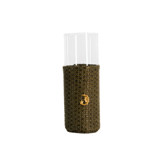 A clear cylindrical glass tumbler with a textured olive green woven sleeve and a small gold crescent moon emblem, shown on a white background.